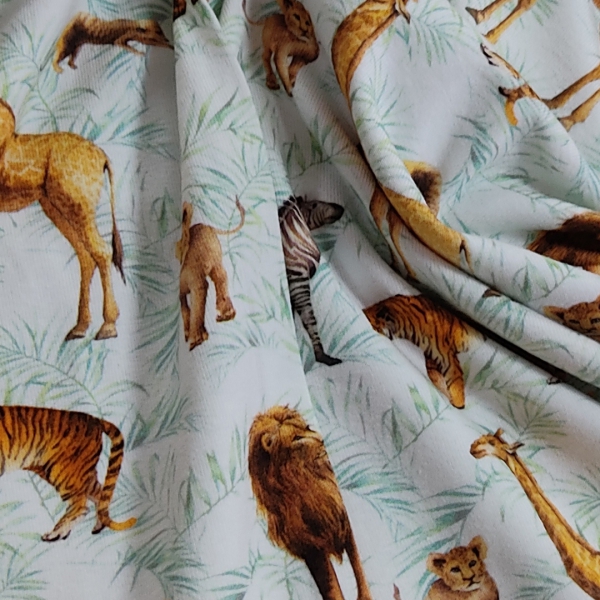 Tela punto de camiseta con motivos de animales de la selva