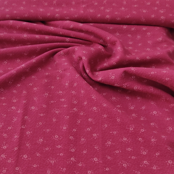 Tela punto de sudadera en granate con estampado minimalista de flores