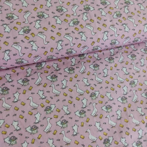 Tela algodón rosa con motivos de animales